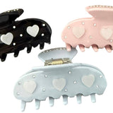 Pearlized triple heart hair clip with rhinestones